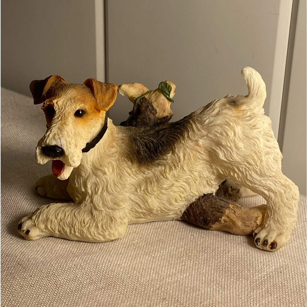 Vintage fox terrier figurine resin Dog and tree trunk